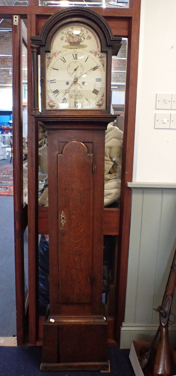 AN OAK LONGCASE CLOCK