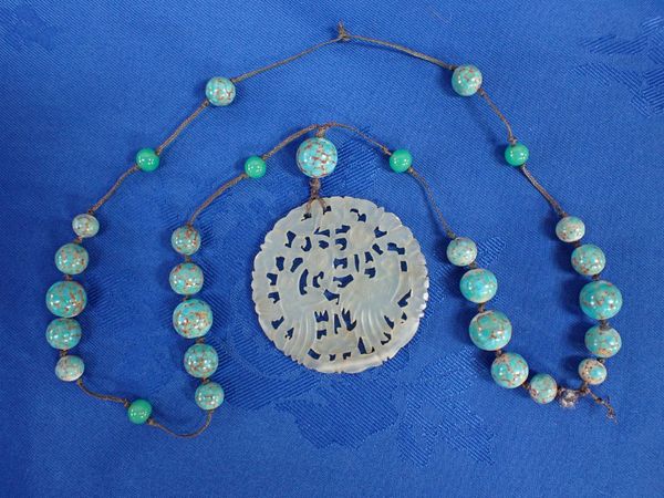 A CHINESE JADE OPENWORK DISC