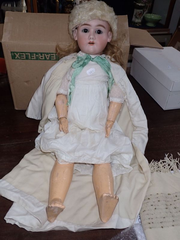 A HEINRICH HANDWERCK BISQUE HEADED DOLL