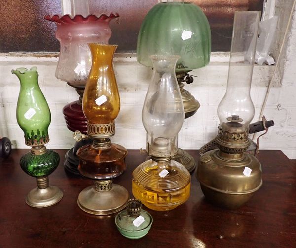 A COLLECTION OF OIL LAMPS