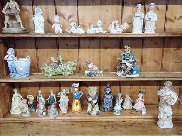 A COLLECTION OF BISUE AND OTHER FIGURINES