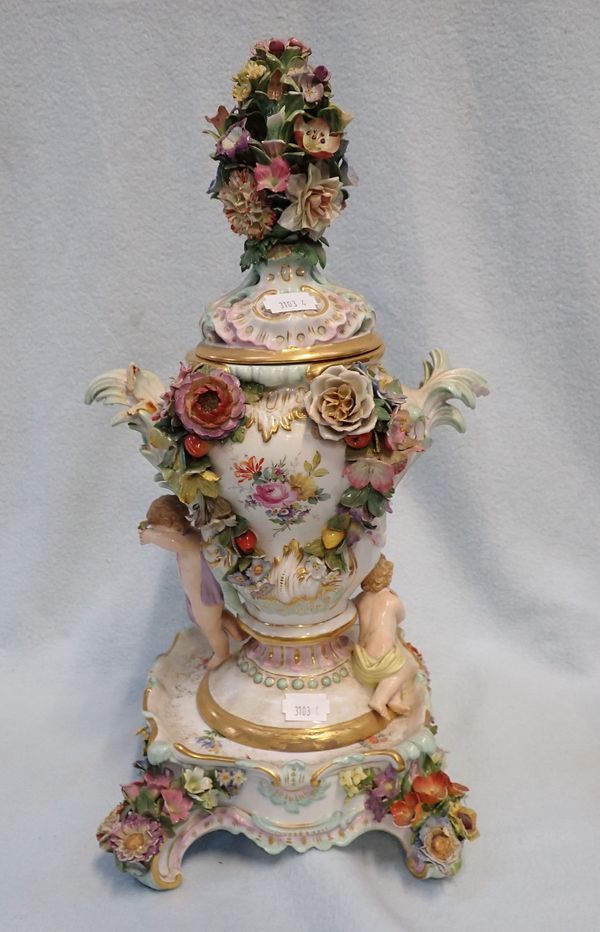 A FLOWER ENCRUSTED VASE, COVER AND STAND