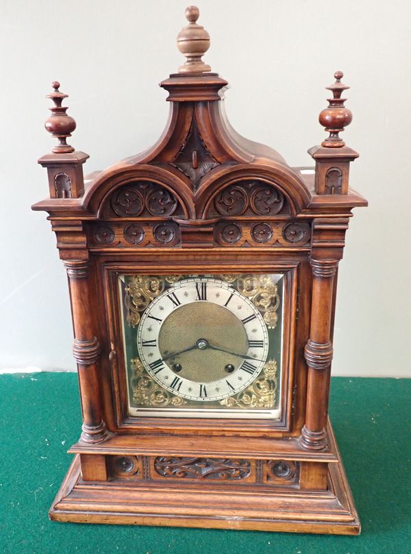 A VICTORIAN BRACKET CLOCK,  IN A FLEMISH STYLE WALNUT CASE