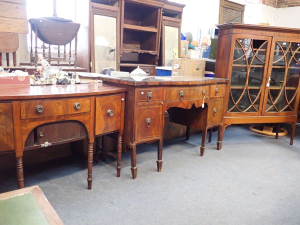 A GEORGE III MAHOGANY SERPENTINE FRONT SIDEBOARD