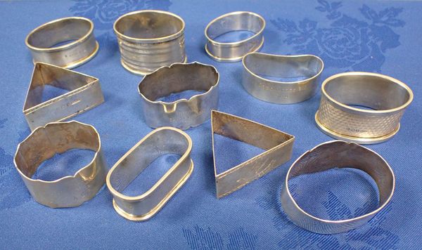 A COLLECTION OF MASONIC SILVER NAPKIN RINGS