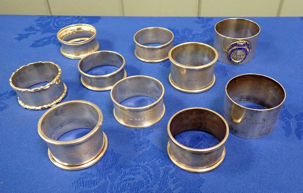 A COLLECTION OF MASONIC SILVER NAPKIN RINGS