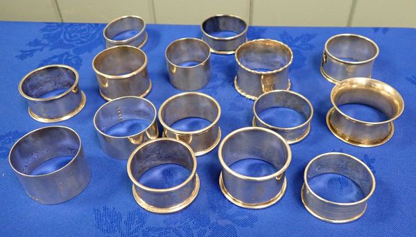 A COLLECTION OF MASONIC SILVER NAPKIN RINGS