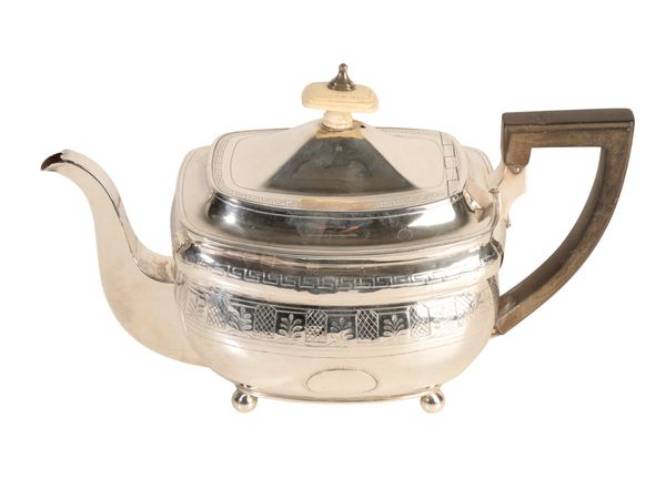 A GEORGE III SILVER TEA POT