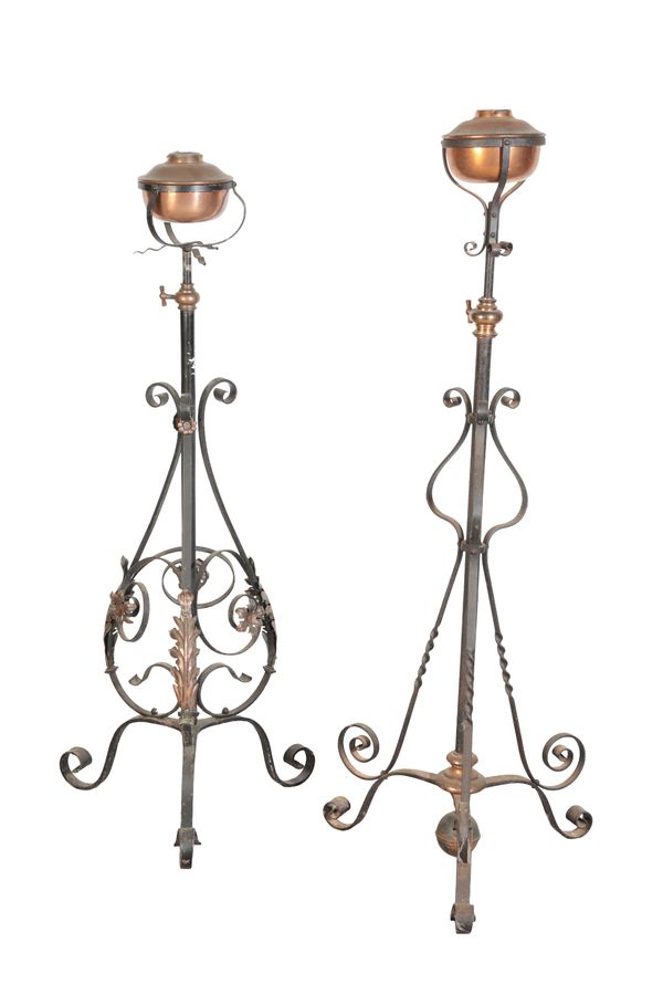 A 19TH CENTURY WROUGHT IRON STANDARD OIL LAMP