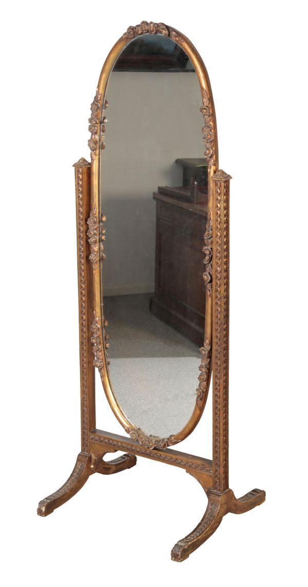 A LOUIS XVI STYLE GILTWOOD AND GESSO CHEVAL MIRROR