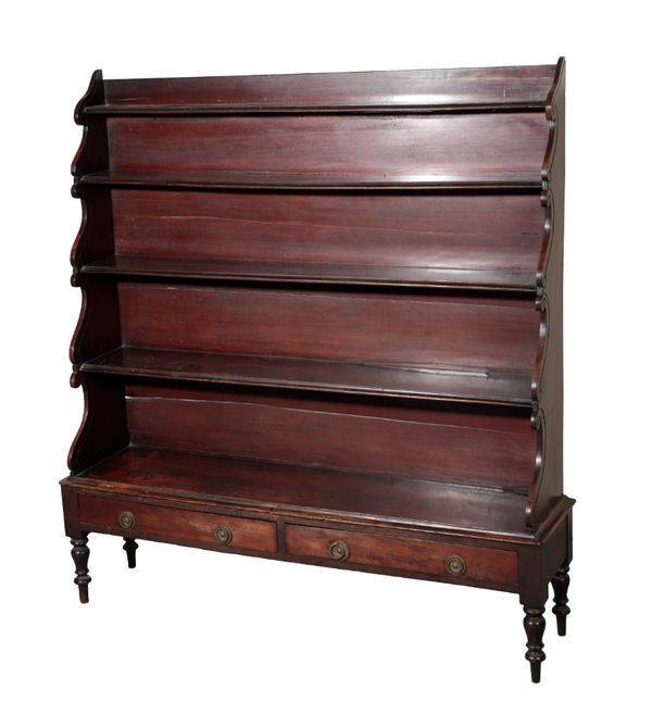 A VICTORIAN MAHOGANY OPEN 'WATERFALL' BOOKCASE