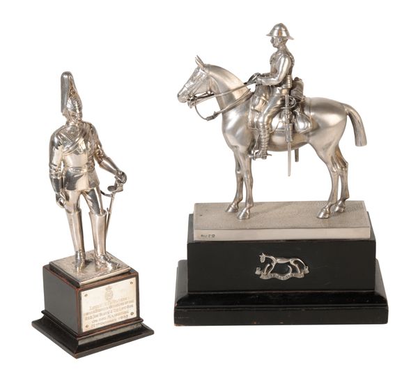 A SILVER MODEL OF AN OFFICER OF THE ROYAL HORSE GUARDS (THE BLUES)