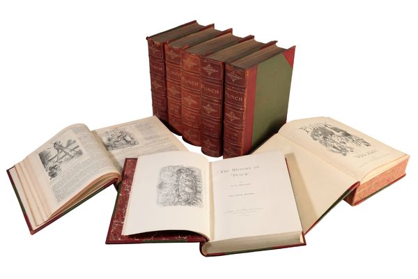 A COLLECTION OF LEATHER-BOUND VOLUMES OF PUNCH MAGAZINE