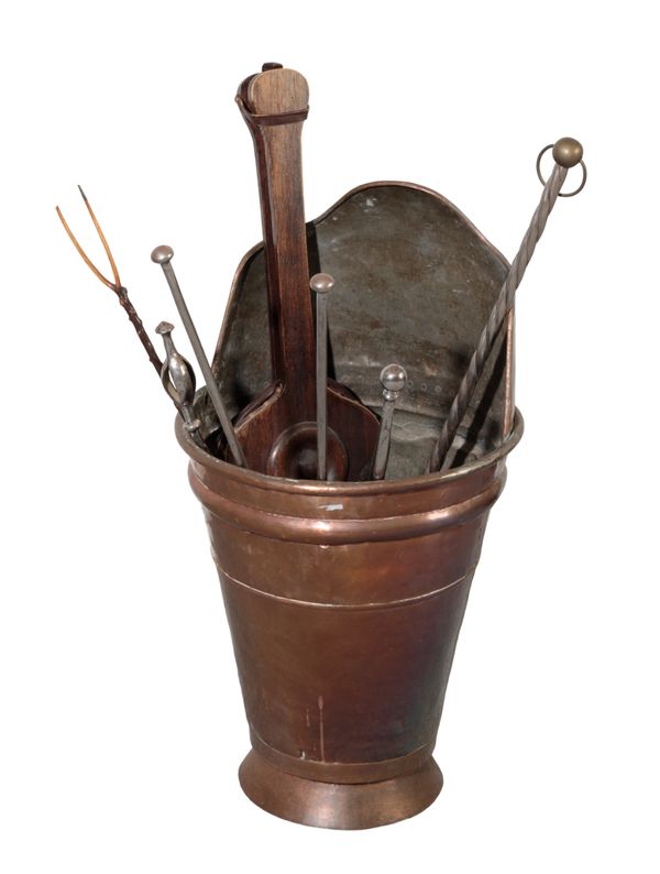 A COPPER COAL BUCKET WITH FIRE IRONS