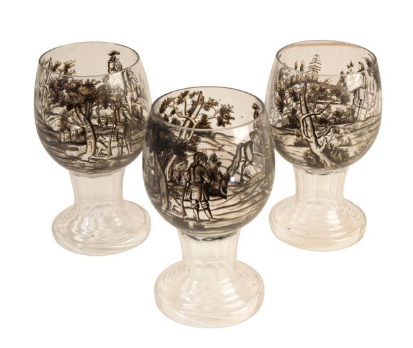 A SET OF THREE SCHWARZLOT ENAMELLED DRINKING GLASSES