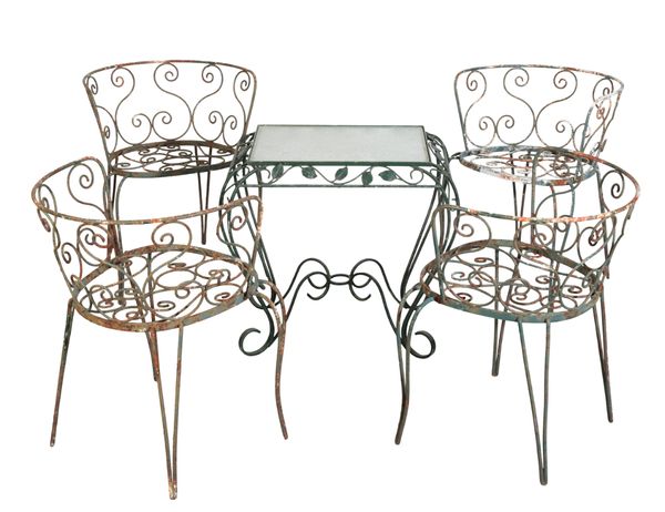 A SET OF FOUR WROUGHT-IRON GARDEN ARMCHAIRS,