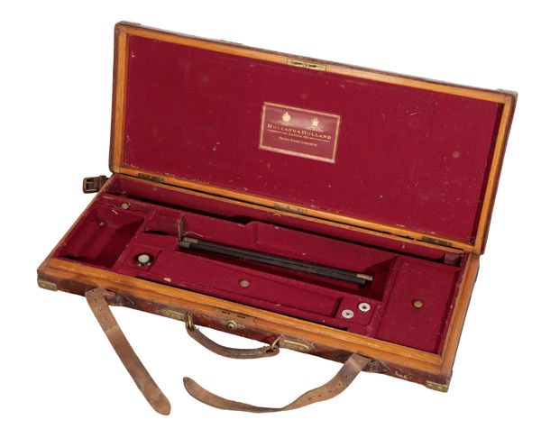 HOLLAND AND HOLLAND: A LEATHER BOUND WOODEN SHOTGUN CASE