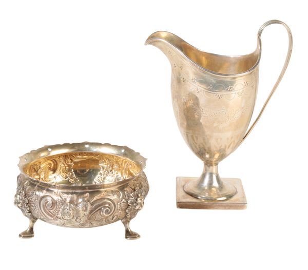 A GEORGE III SILVER JUG