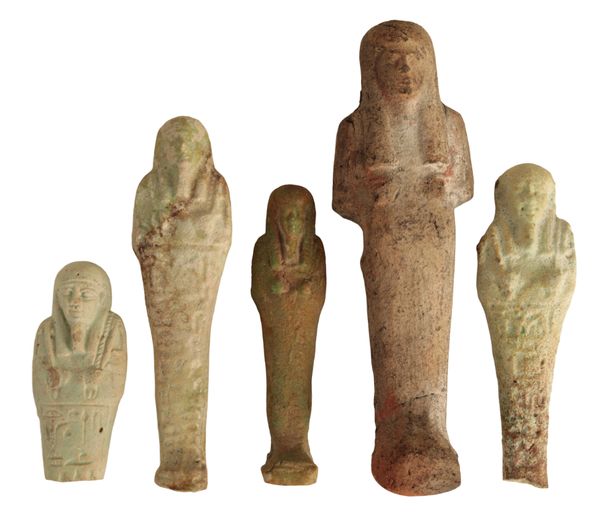 AN EGYPTIAN FAIENCE SHABTI