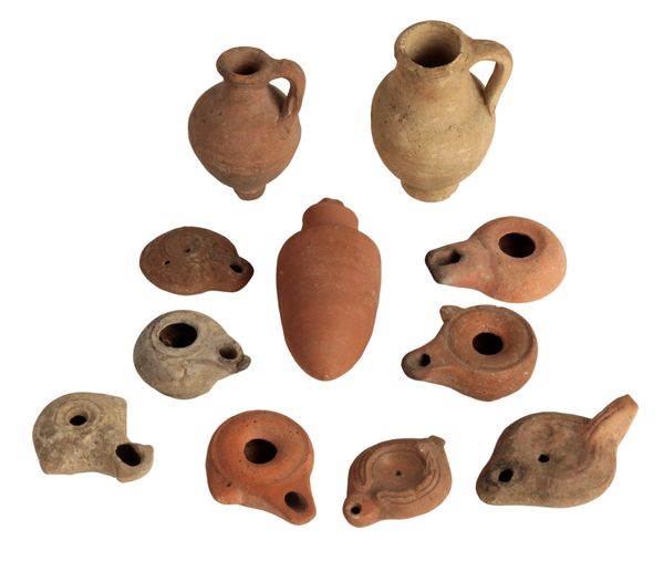 A COLLECTION OF ROMAN AND OTHER OIL LAMPS