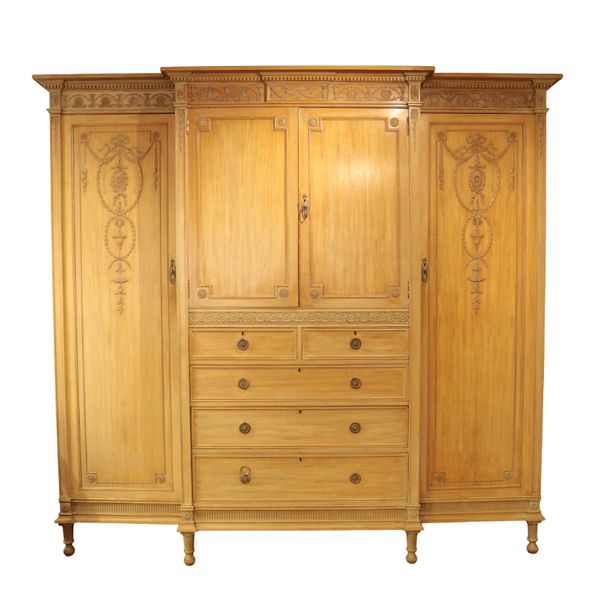 AN EDWARDIAN BLEACHED MAHOGANY WARDROBE IN GEORGE III STYLE