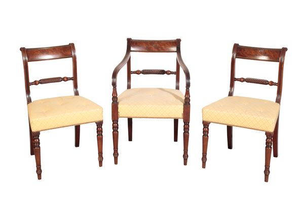 AN ASSOCIATED SET OF SEVEN REGENCY MAHOGANY DINING CHAIRS