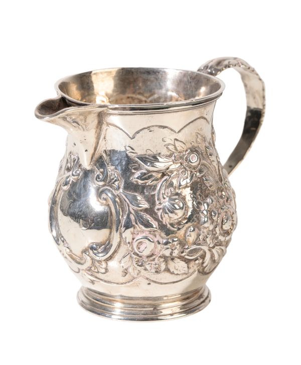 A GEORGE IV SILVER CREAM JUG