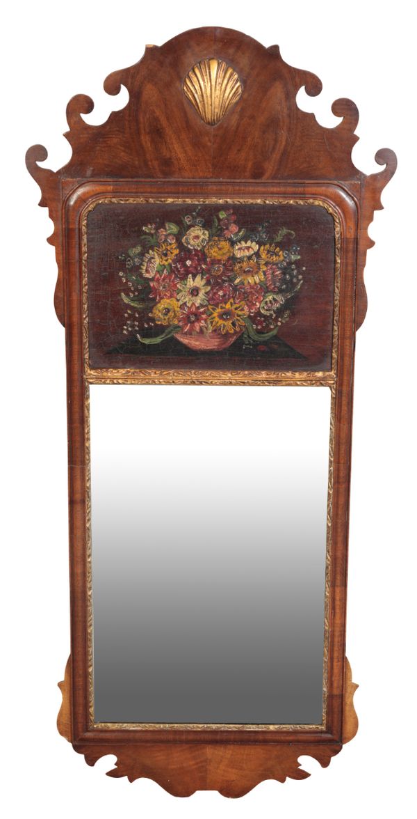 A GEORGE II STYLE WALNUT AND PARCEL-GILT MIRROR