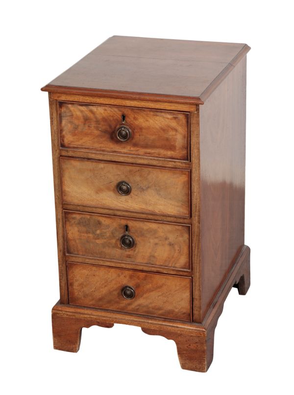 A NARROW CHEST OF FOUR DRAWERS