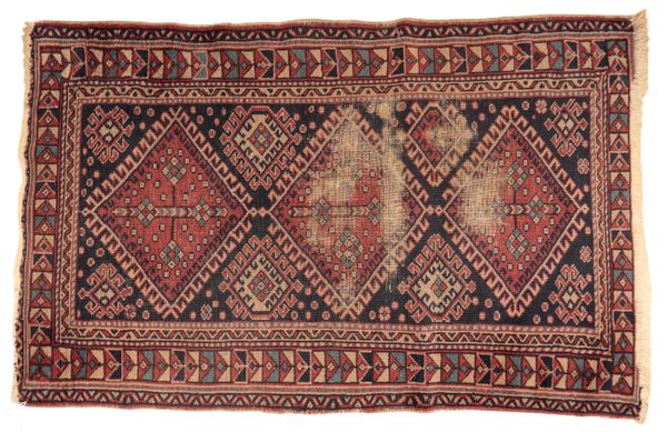 A TEKKE BOKHARA STYLE RUG,