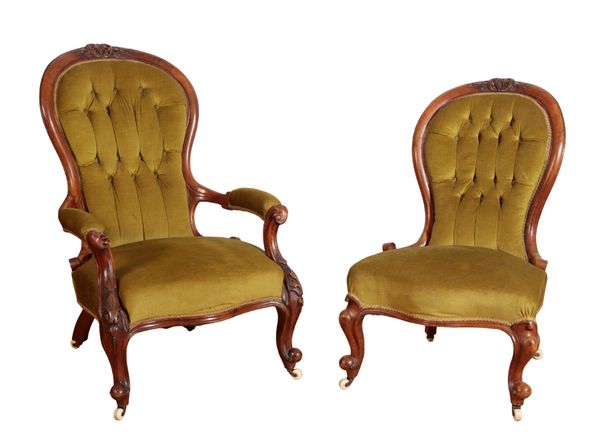 A VICTORIAN WALNUT SPOONBACK ARMCHAIR