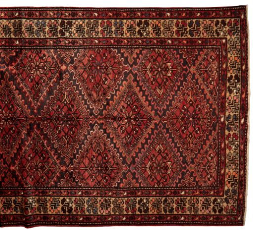 A NORTH WEST PERSIAN KURDISH CARPET