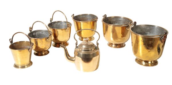 A COLLECTION OF SIX GRADUATED BRASS BUCKETS