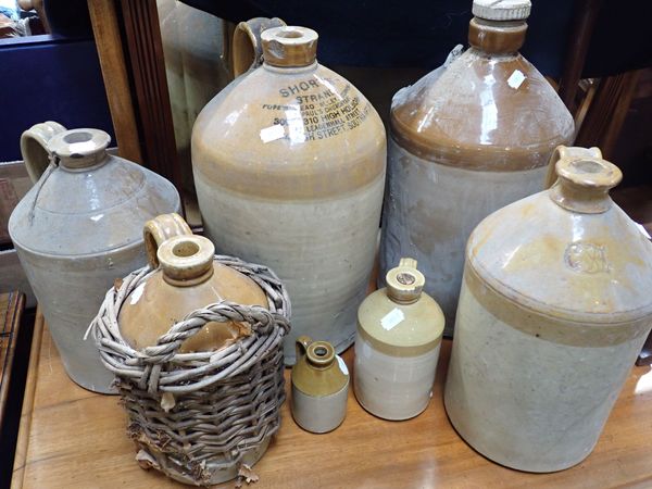 A COLLECTION OF STONEWARE FLAGONS