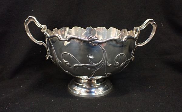 A SILVER ART NOUVEAU TWO-HANDLED ROSE BOWL