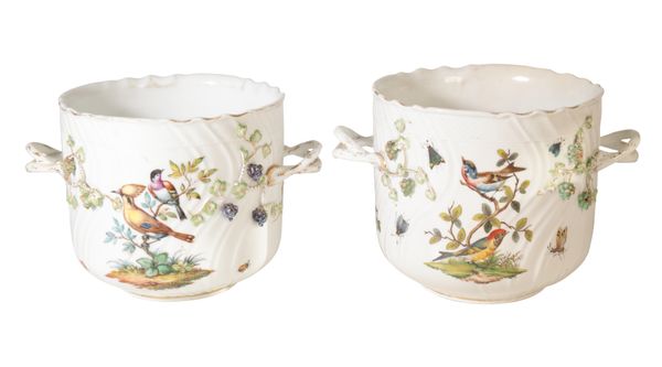 A NEAR PAIR OF MEISSEN STYLE PORCELAIN CACHE-POTS