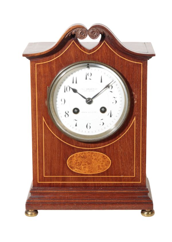 A MAHOGANY MANTEL CLOCK