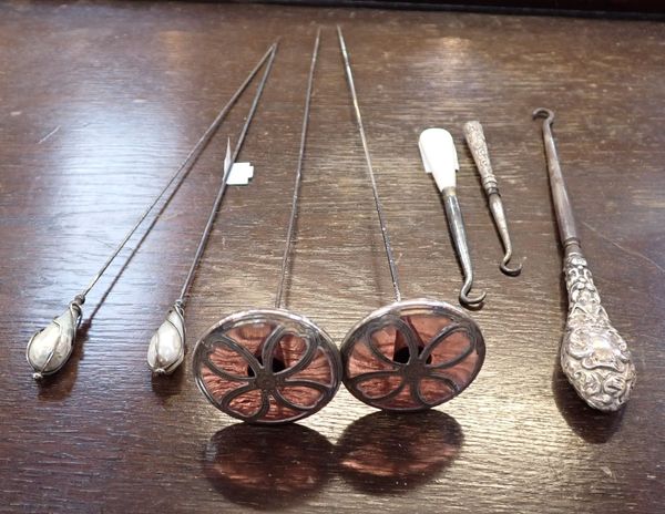 FOUR EDWARDIAN HAT PINS