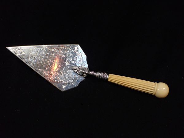 A SILVER CEREMONIAL FOUNDATION-STONE TROWEL