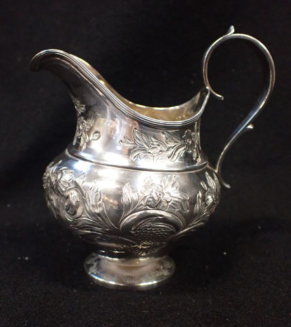 A GEORGE III BALUSTER MILK JUG