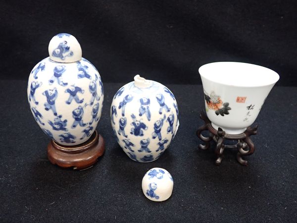 A PAIR OF MINIATURE CHINESE COVERED JARS