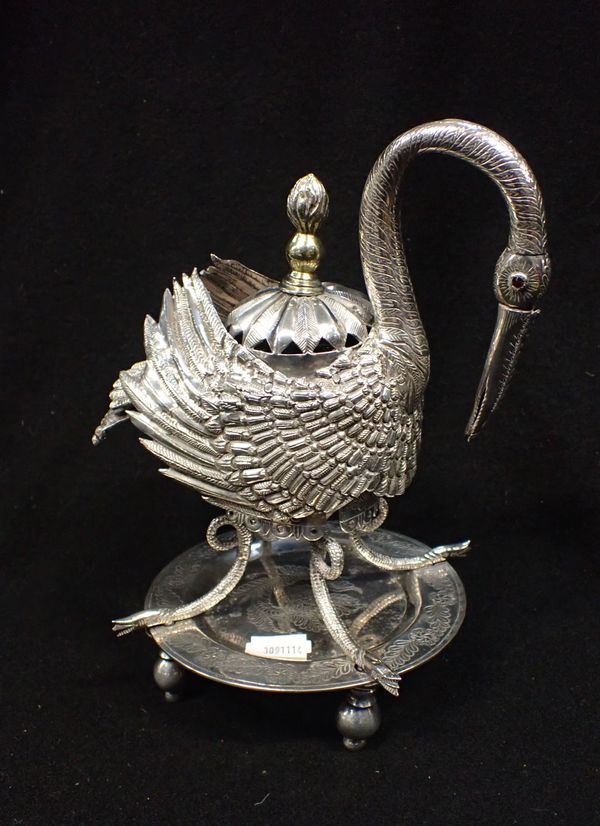 A WHITE METAL EXOTIC BIRD CENTRE-PIECE WITH JEWELLED EYES