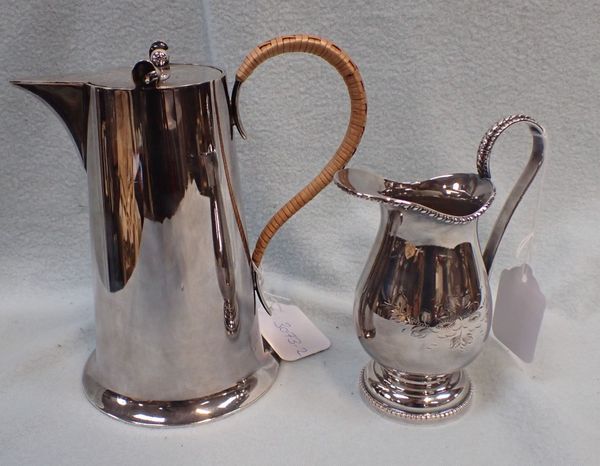 AN ART DECO SILVER-PLATED WATER JUG AND A PLATED CREAM JUG