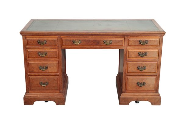 AN EDWARDIAN OAK PEDESTAL DESK