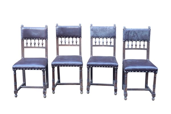 A SET OF EIGHT OAK GOTHIC REVIVAL DINING CHAIRS