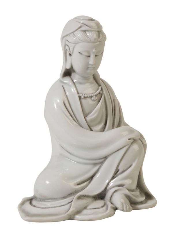 A CHINESE BLANC-DE-CHINE FIGURE OF GUANYIN, DEHUA