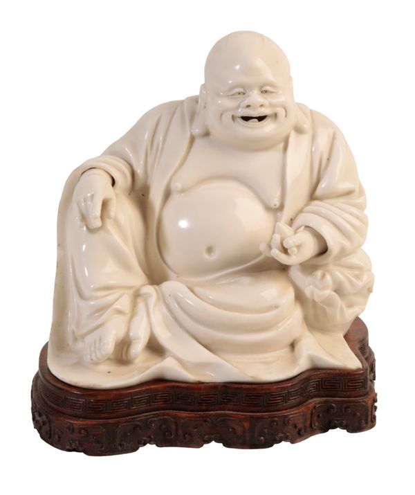 A CHINESE BLANC DE CHINE FIGURE OF HOTEI,
