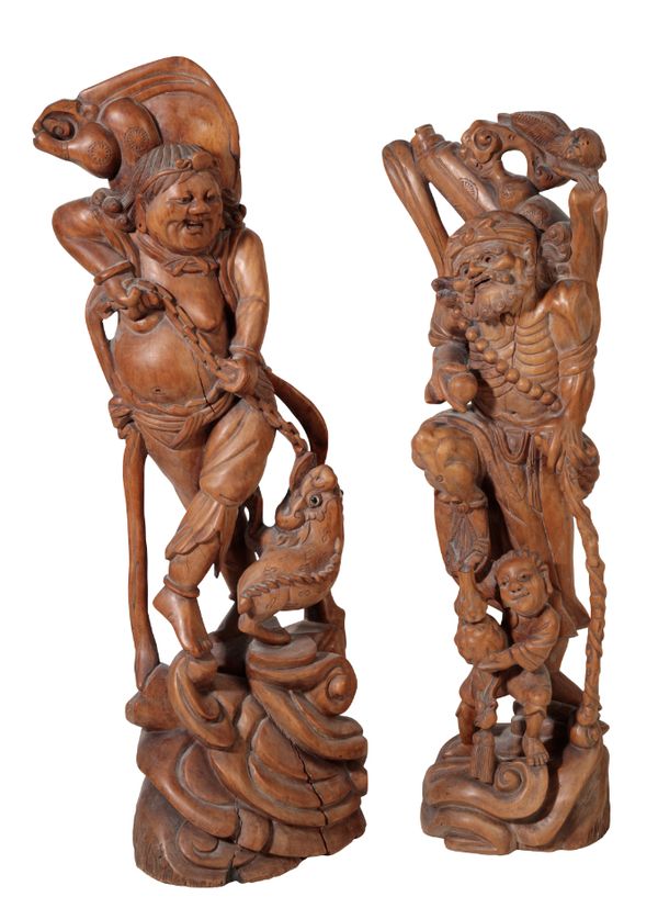 A PAIR OF CHINESE HARDWOOD FIGURES