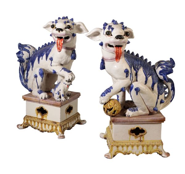 A PAIR OF CHINESE STYLE POTTERY BUDDHISTIC DOGS OF FO