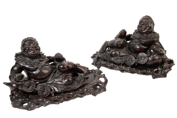 A PAIR OF JAPANESE HARDWOOD FIGURES OF IMMORTALS